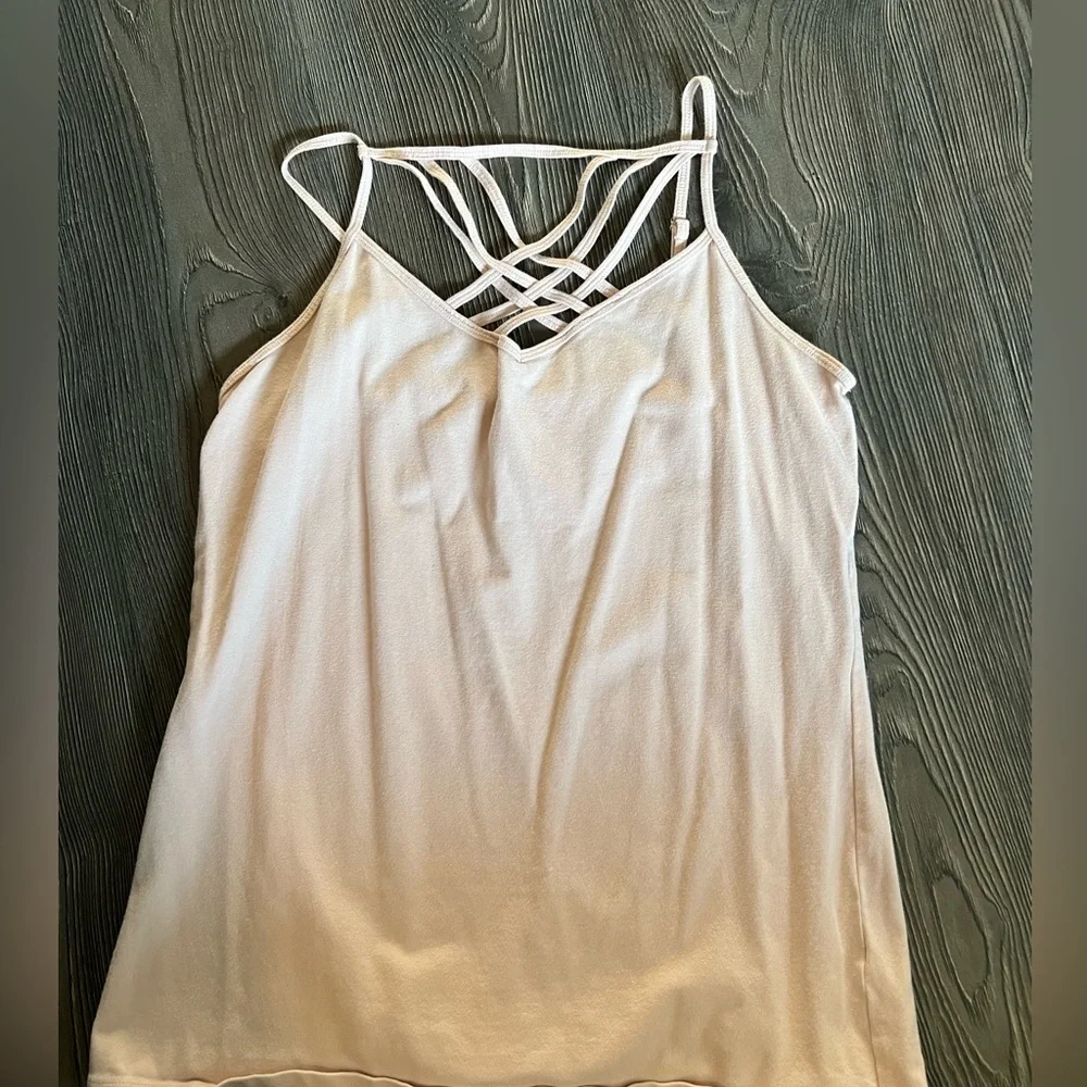 Maurice’s size large fitted tank with cute cutout chest design. Spaghetti strap - Picture 1 of 3
